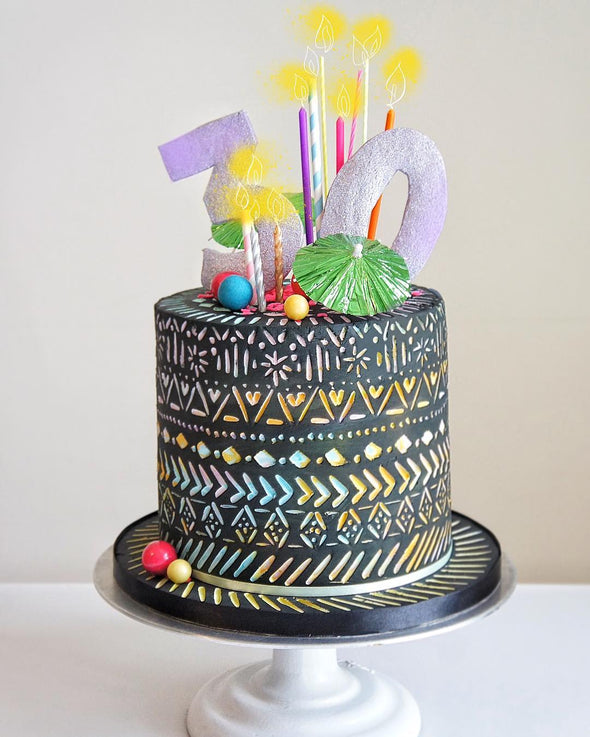 Neon tribal carved cake - Tuck Box Cakes