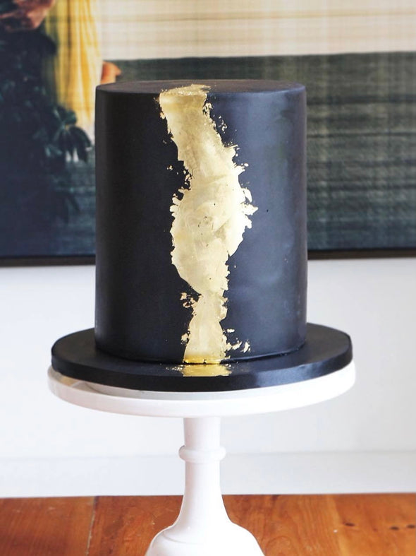 tall gold tear cake