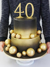 Black and gold spheres cake