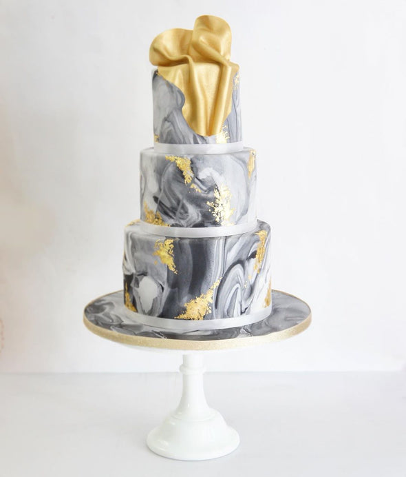 Marble and liquid gold cake - Tuck Box Cakes